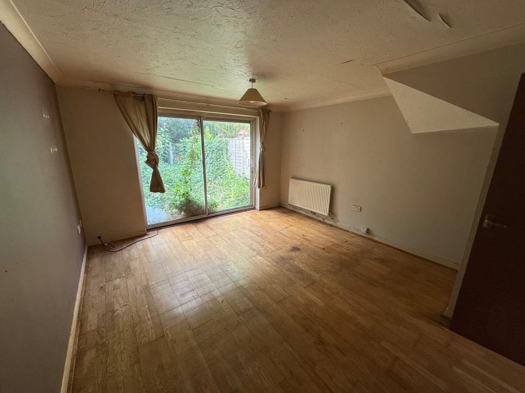 Lot: 131 - HOUSE FOR IMPROVEMENT - Living room looking towards rear garden